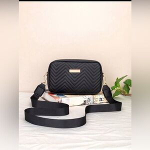 Mini chevron medal detail fashion quilted crossbody bag.